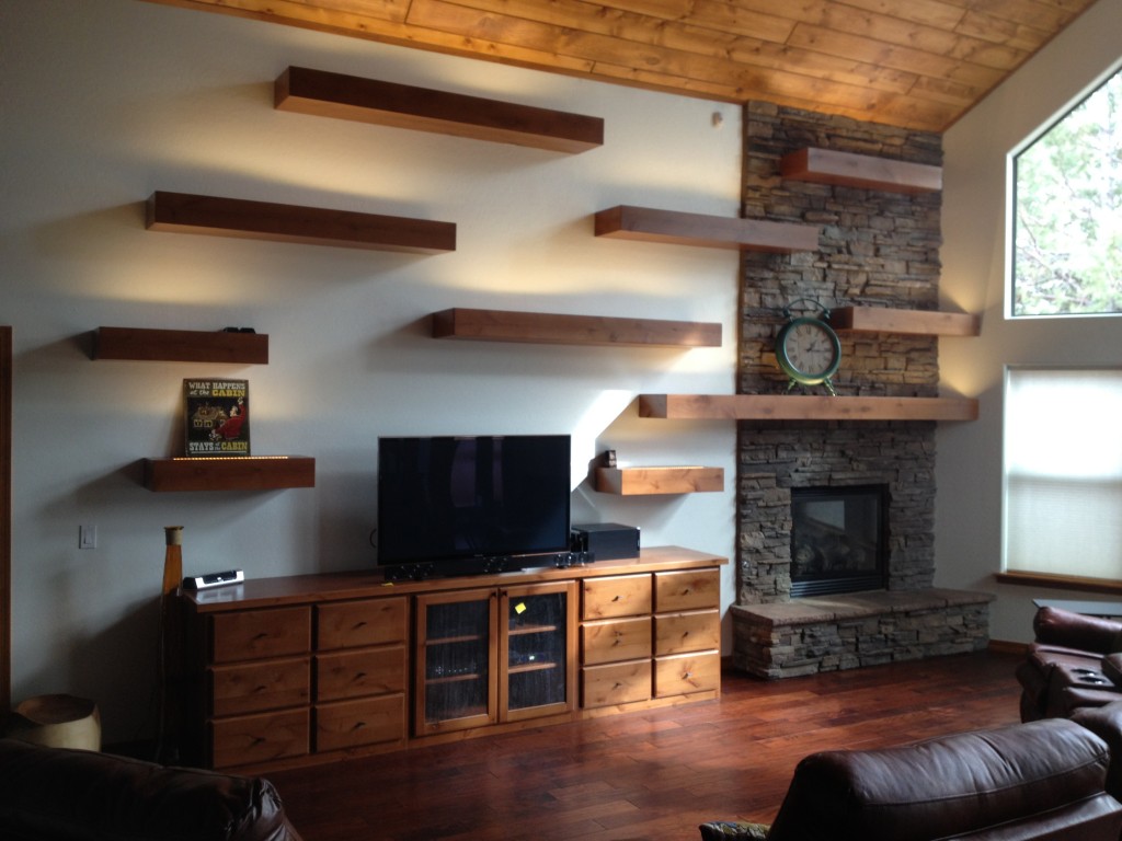 Lighted floating book shelves for a beautiful room! It's Just Wood builds them custom for your room.
